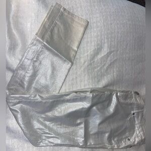 Metallic silver skinny pants.